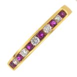 An 18ct gold ruby and brilliant-cut diamond half eternity ring.Estimated total diamond weight