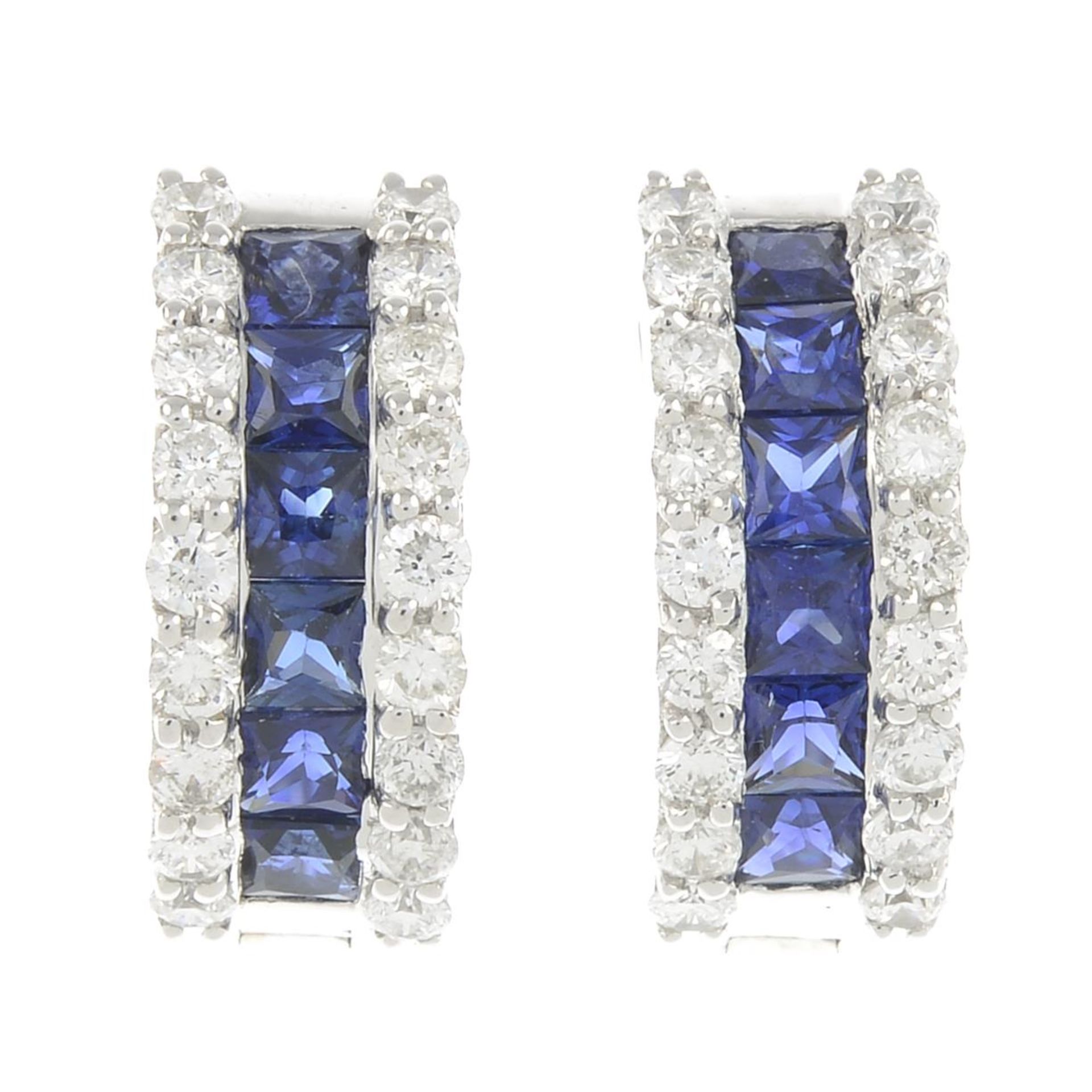 A pair of sapphire and brilliant-cut diamond earrings.Total sapphire weight 1.62cts.Total diamond