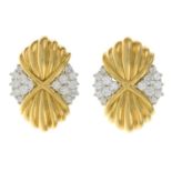 A pair of brilliant-cut diamond and grooved earrings.Estimated total diamond weight 3.20cts,