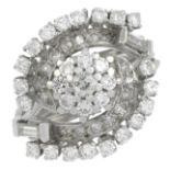 A vari-cut diamond cluster ring, with openwork sides.