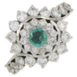 An emerald and brilliant-cut diamond cluster ring.Estimated total diamond weight 1.55cts,