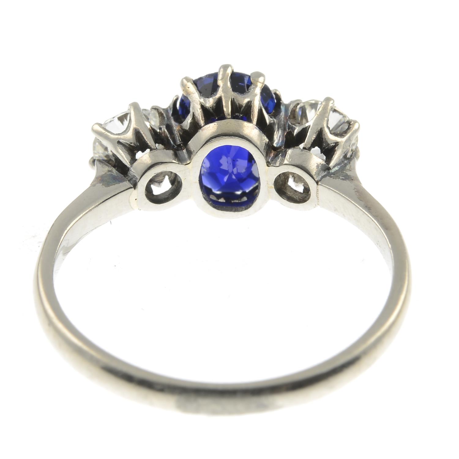 A Sri Lankan sapphire and old-cut diamond three-stone ring.With report 18499, - Image 2 of 3