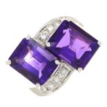 An amethyst two-stone crossover ring,