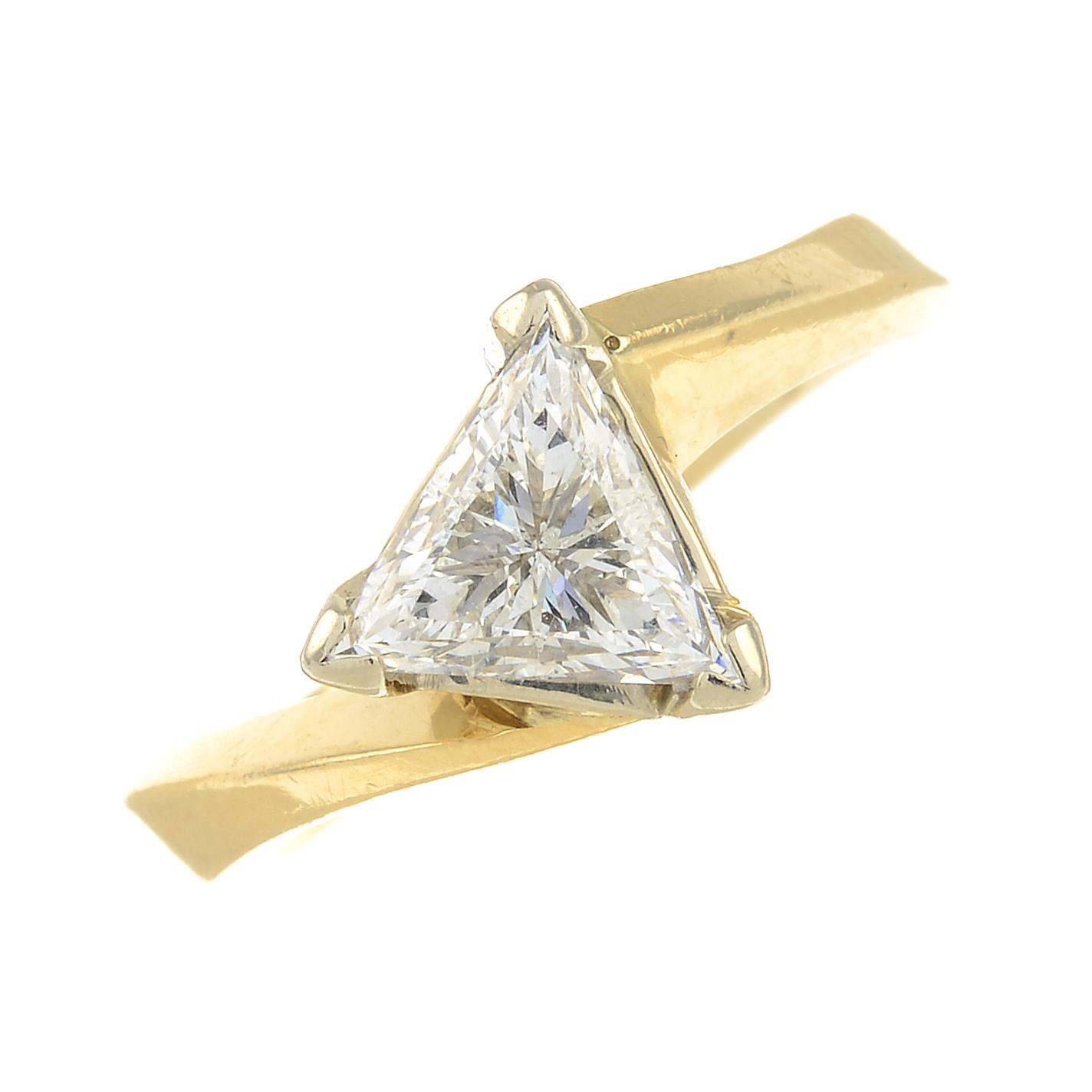 A triangular-shape diamond single-stone ring.