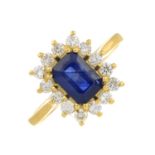 An 18ct gold sapphire and brilliant-cut diamond cluster ring.Estimated total diamond weight 0.45ct,