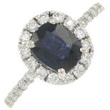 A sapphire and brilliant-cut diamond cluster ring.Estimated total diamond weight 0.30ct,