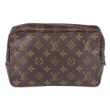 LOUIS VUITTON - a vintage Monogram PM toiletry pouch.