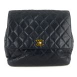 CHANEL - a quilted leather backpack.