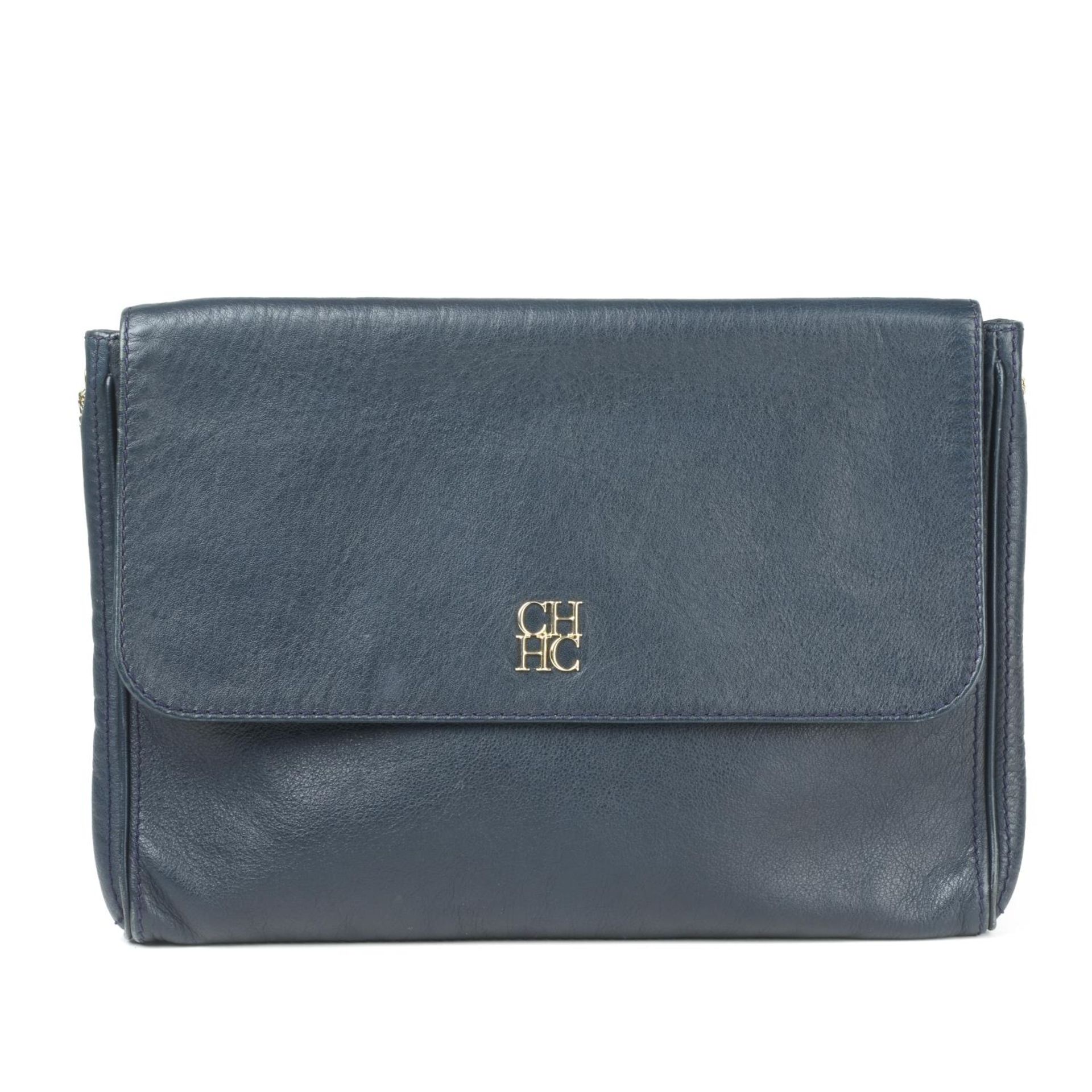 CAROLINA HERRERA - a leather handbag.