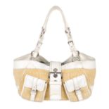 PRADA - a natural woven straw handbag.