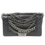 CHANEL - a Small Enchained Boy Flap handbag.