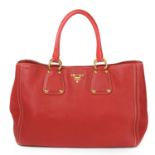 PRADA - a red Vitello Daino handbag.