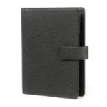 LOUIS VUITTON - a black Taiga Agenda MM diary.