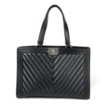 CHANEL - a Chevron Quilted Boy Tote handbag.