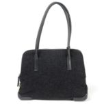 PRADA - a wool handbag.