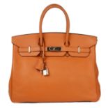 HERMÈS - a 2003 orange Togo Birkin 35 handbag.