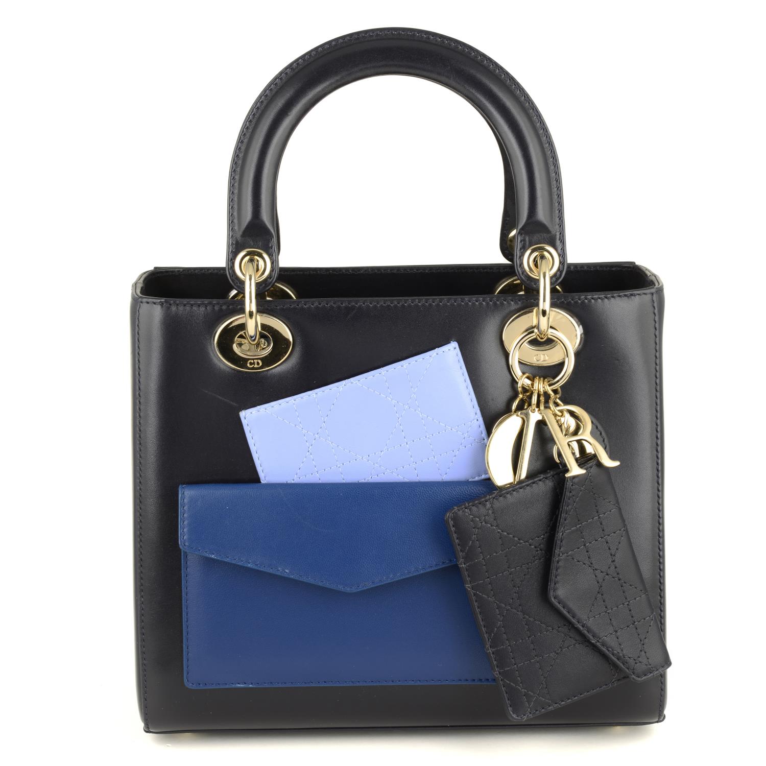 CHRISTIAN DIOR - a limited edition Lady Dior Pockets MM handbag.
