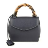 BUTI PELLETTERIE - a mini Minny navy blue leather handbag.