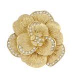 CHRISTIAN DIOR - a flower brooch.