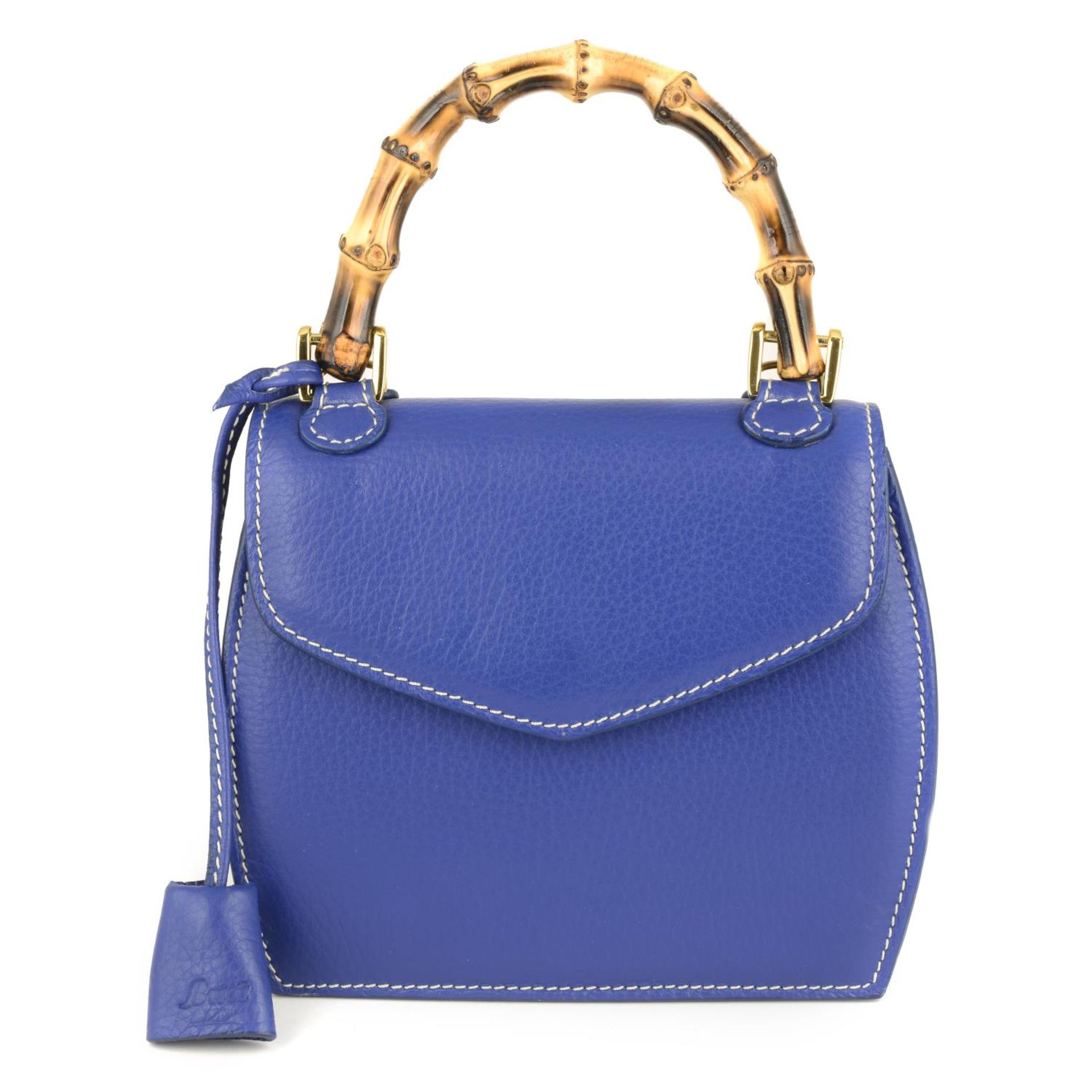 BUTI PELLETTERIE - a mini Minny royal blue leather handbag.
