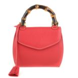 BUTI PELLETTERIE - a mini Minny red leather handbag.