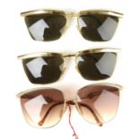 Seven pairs of designer sunglasses.