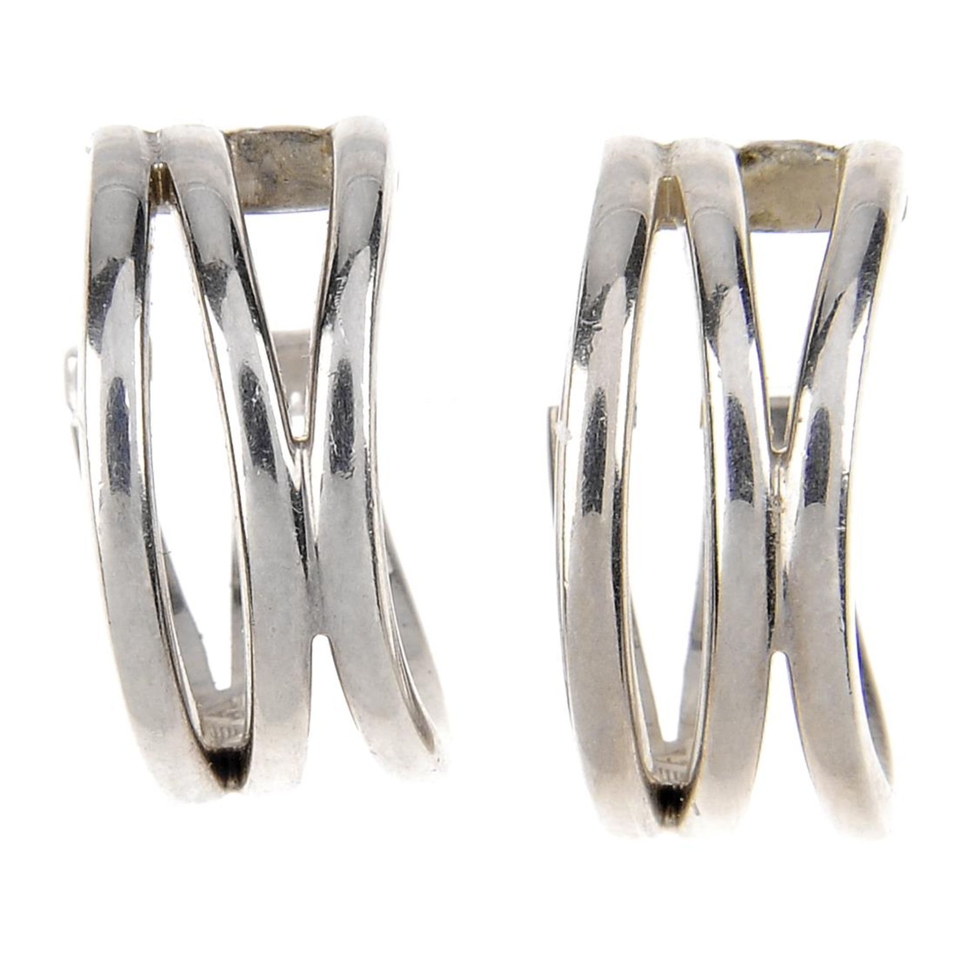 EMPORIO ARMANI - a pair of silver hoop earrings.