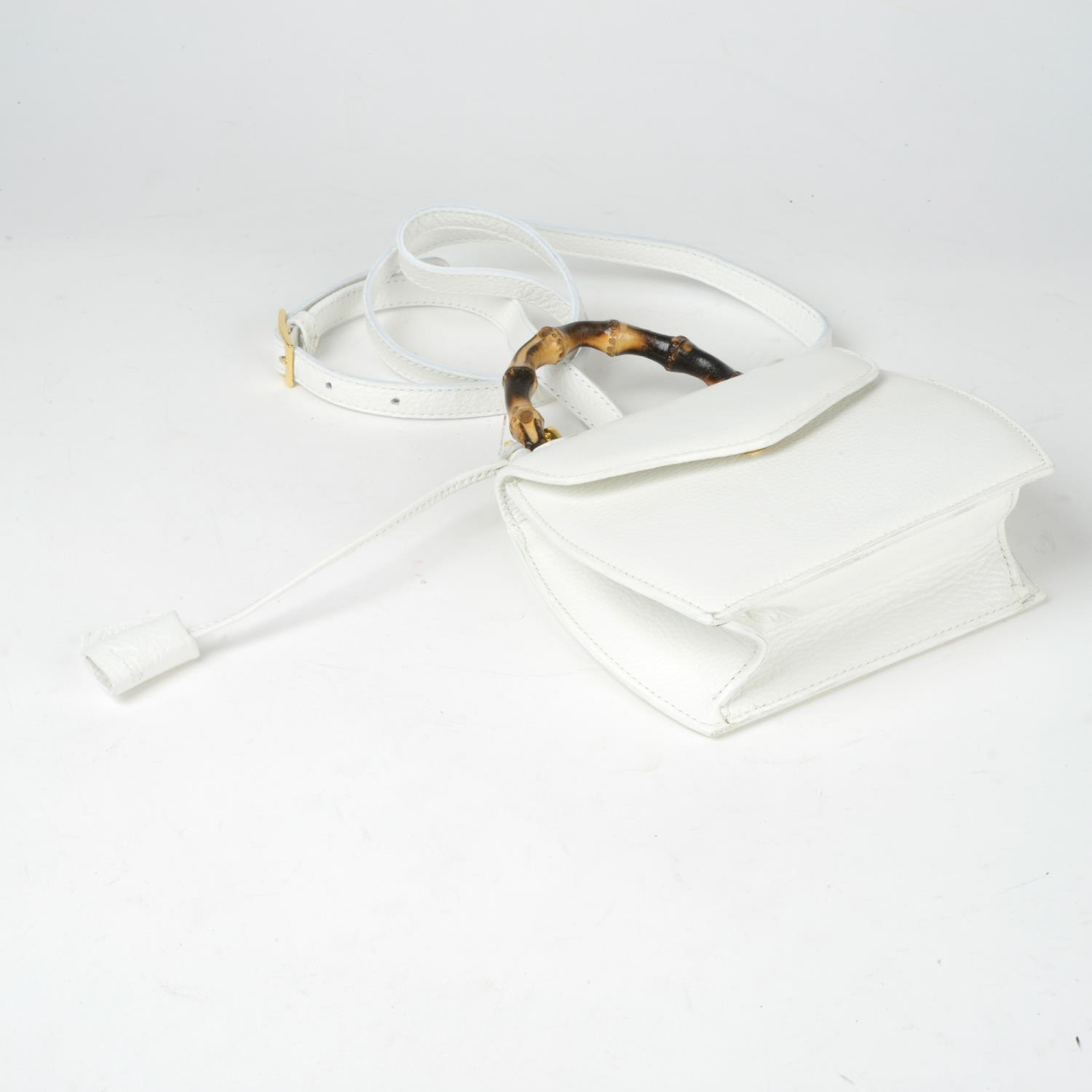 BUTI PELLETTERIE - a mini Minny white leather handbag. - Image 4 of 4