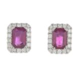 A pair of 18ct gold ruby and brilliant-cut diamond earrings.Total ruby weight 0.95ct.Total diamond
