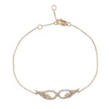 An 18ct gold brilliant-cut diamond wings bracelet.Total diamond weight 0.32ct,