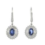 A pair of 18ct gold sapphire and vari-cut diamond earrings.Total sapphire weight 2.74cts.Total