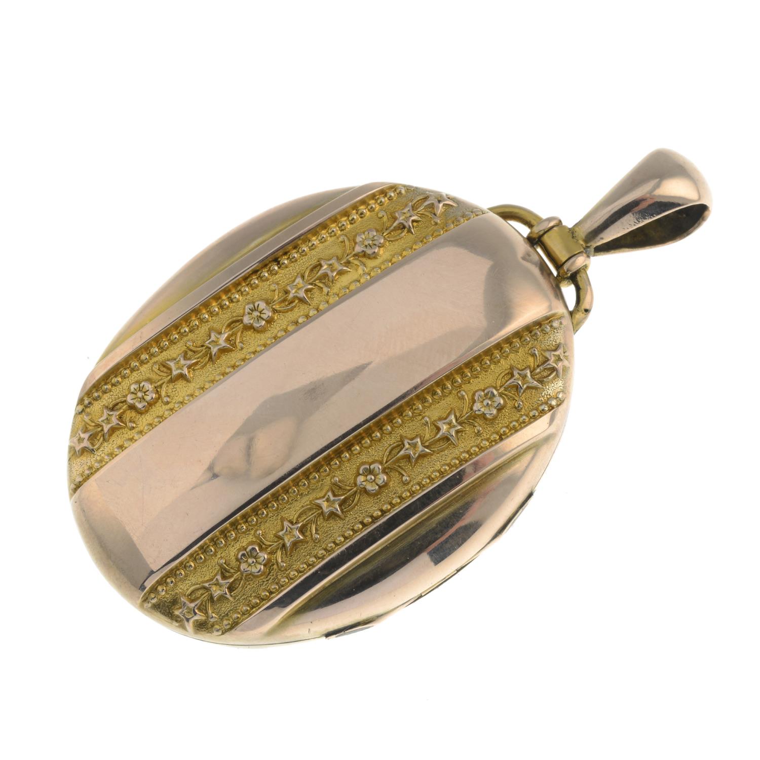 A late Victorian gold coral and split pearl locket.Length 6cms. - Image 3 of 3