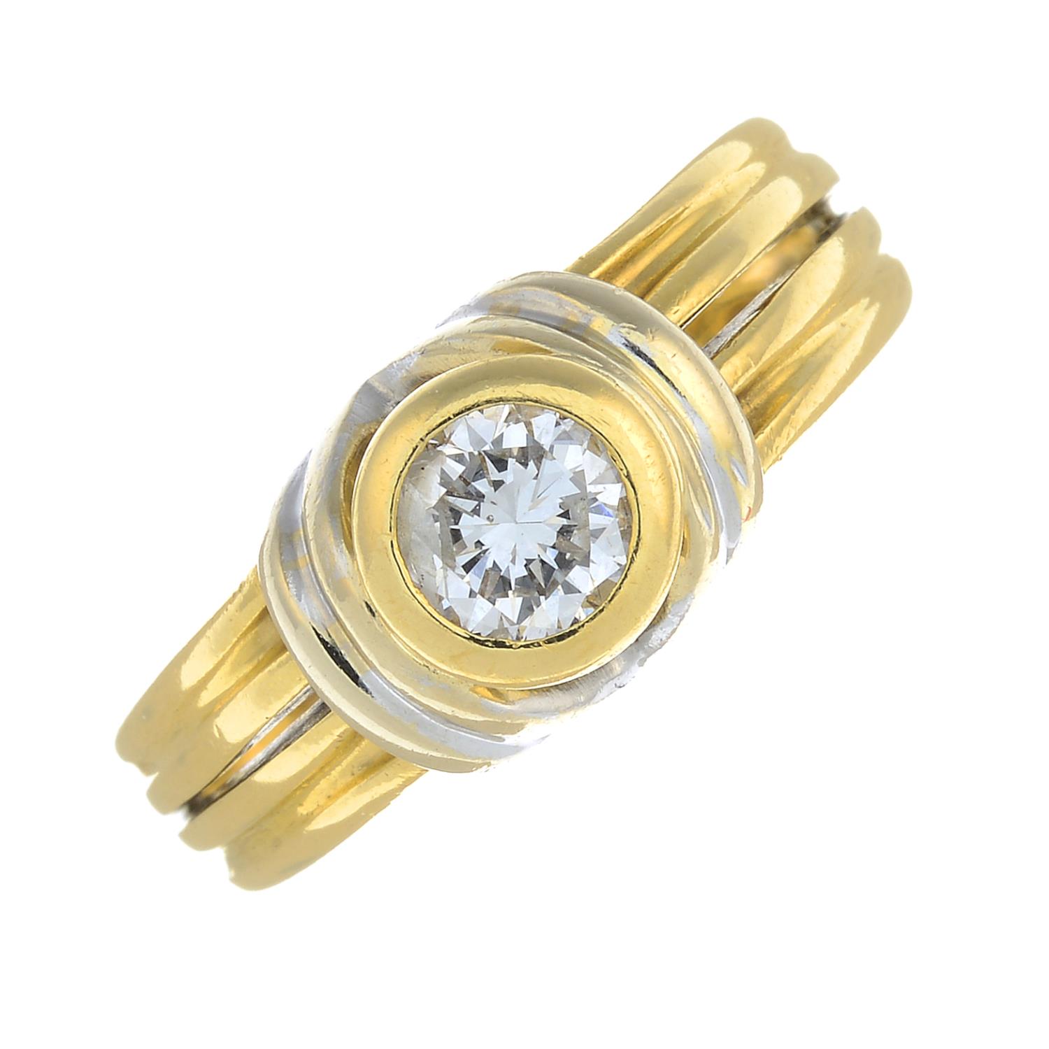 An 18ct bi-colour gold brilliant-cut diamond dress ring.Estimated diamond weight 0.40ct,