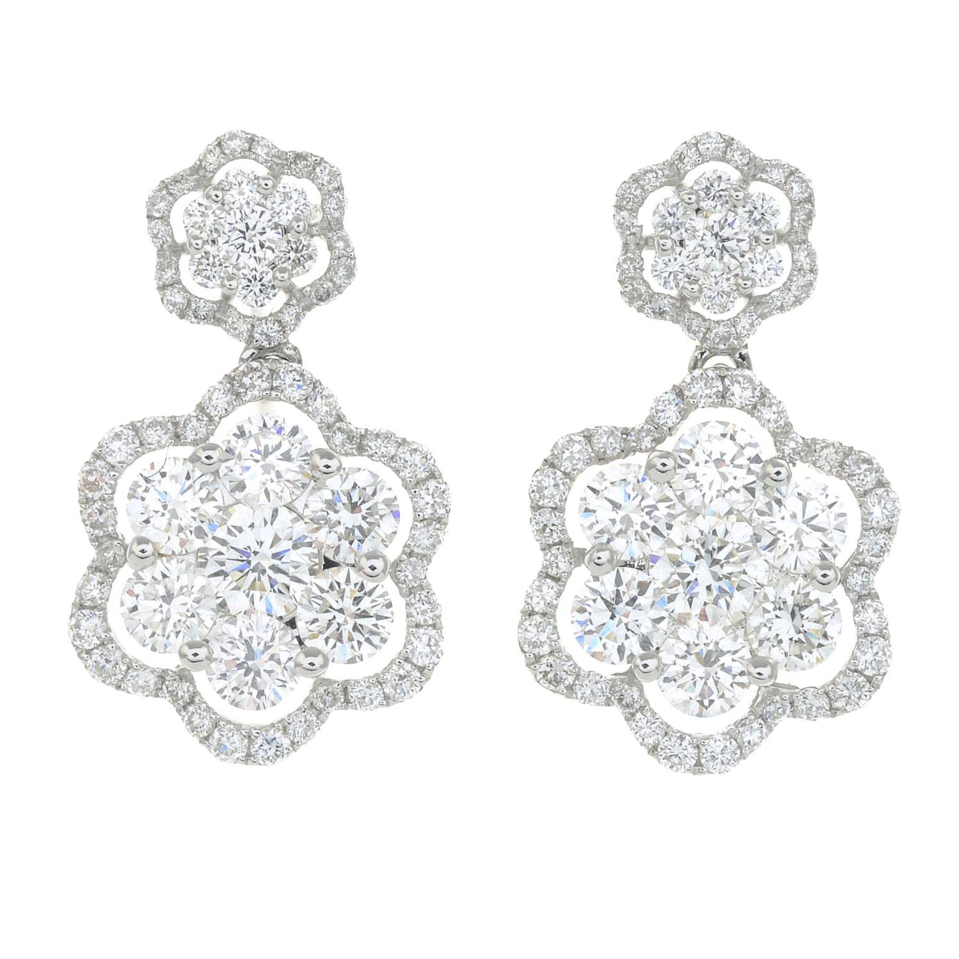 A pair of 18ct gold brilliant-cut diamond floral cluster drop earrings.Estimated total diamond