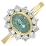 An 18ct gold emerald and brilliant-cut diamond cluster ring.Emerald calculated weight 0.76ct,