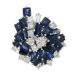 A sapphire and vari-cut diamond cluster ring.Estimated total diamond weight 1.35cts,