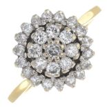 An 18ct gold brilliant-cut diamond cluster ring.Estimated total diamond weight 0.80ct,