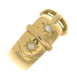 An early 20th century 18ct gold old-cut diamond buckle ring.Estimated total diamond weight 0.10ct,