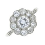 A brilliant and circular-cut diamond cluster ring.Principal diamond weight 0.50ct,