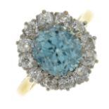 An 18ct gold blue zircon and old-cut diamond cluster ring.Zircon weight 3.53cts.Estimated total