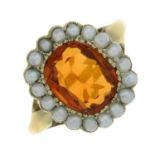 A citrine and seed pearl cluster ring.Citrine weight 3.25cts.Ring size M.