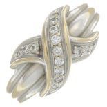 A brilliant-cut diamond 'Signature X Kiss' ring,