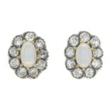A pair of opal and old-cut diamond earrings.Estimated total diamond weight 0.40ct,