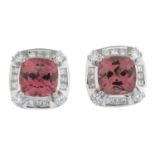 A pair of orangish-pink tourmaline and vari-cut diamond cluster earringsTotal calculated tourmaline