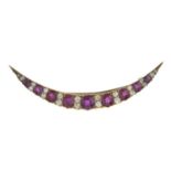 A late 19th century gold Thai ruby and old-cut diamond crescent brooch.With report 80249-21,