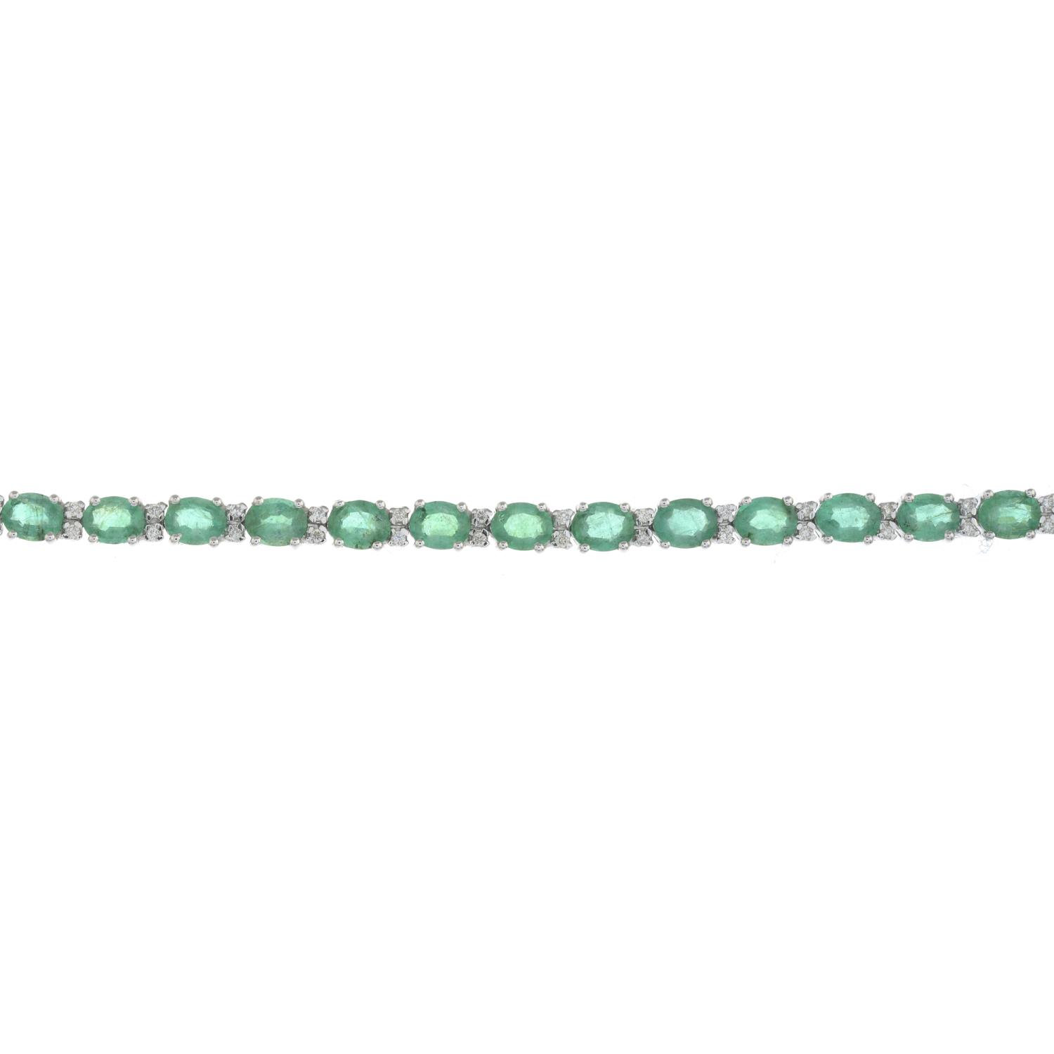 An 18ct gold emerald and brilliant-cut diamond line bracelet.Emerald weight 6.41cts.Diamond weight