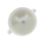 A cultured pearl single-stone ring.Cultured pearl measuring approximately 15.3mms.Stamped 750.Ring