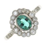 A mid 20th century 18ct gold emerald and single-cut diamond cluster ring.Emerald calculated weight