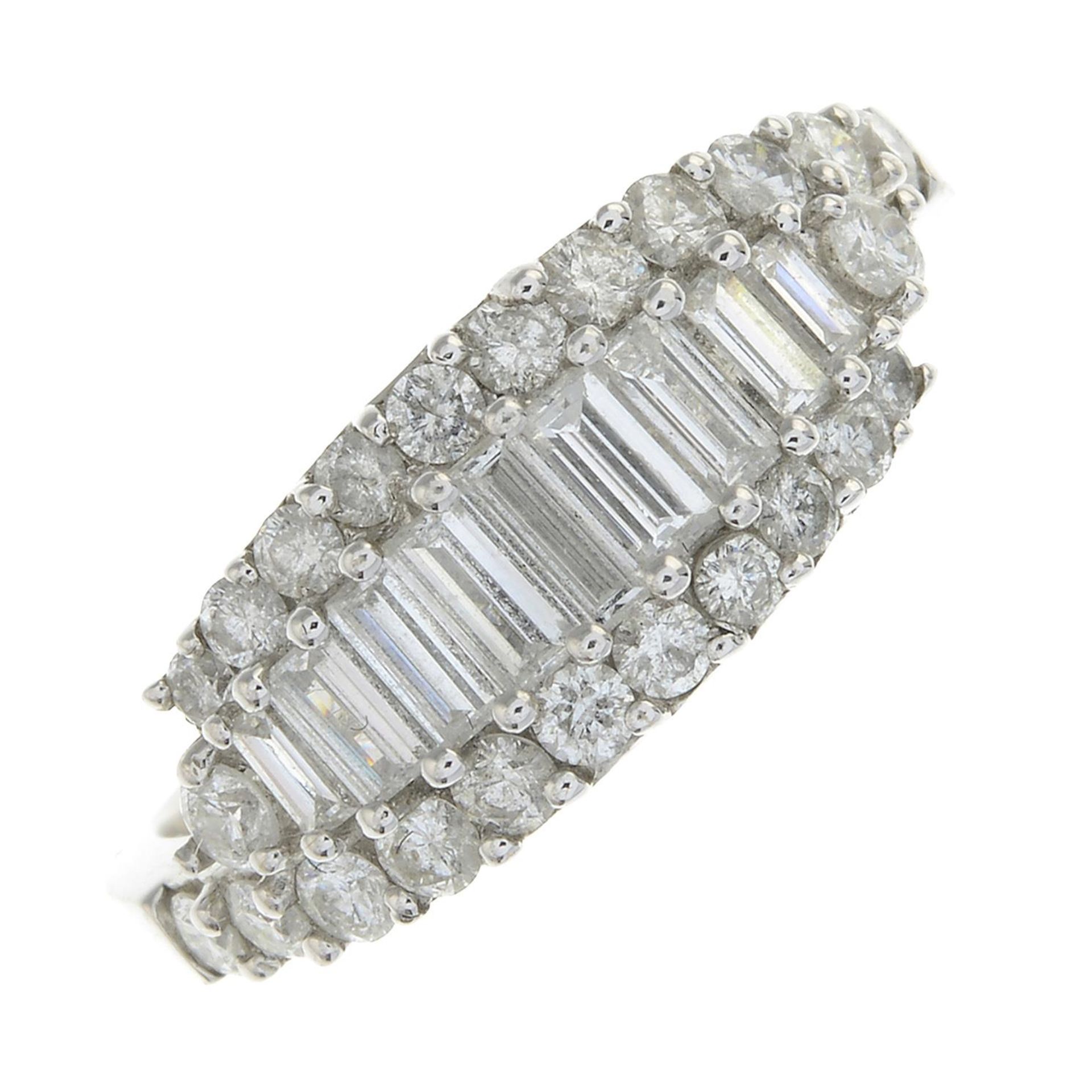A brilliant and baguette-cut diamond dress ring.Estimated total diamond weight 1ct,