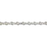 A brilliant-cut diamond line bracelet.Estimated total diamond weight 1.35cts,